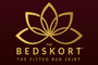 The Bedskort, the fitted bed skirt.  Stays in place, easy to install, professional look, and doesn't get in the way of making the bed.