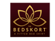 The Bedskort, the fitted bed skirt.  Stays in place, easy to install, professional look, and doesn't get in the way of making the bed.